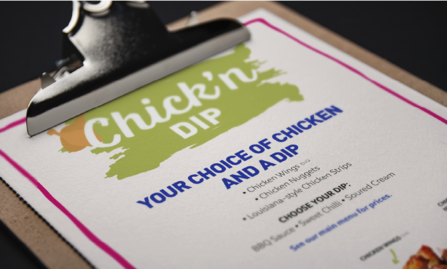 Greene King menu on a clipboard.