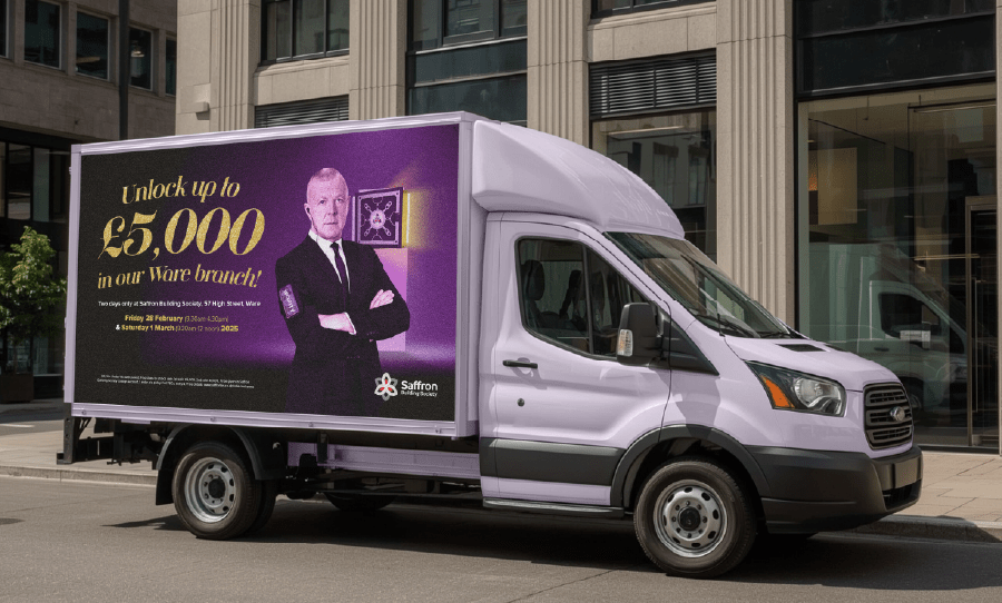 A white box van parked on a street, displaying a purple advertisement offering “Unlock up to £5,000 in our Ware branch” with a suited security man in front of a safe pictured on the side.