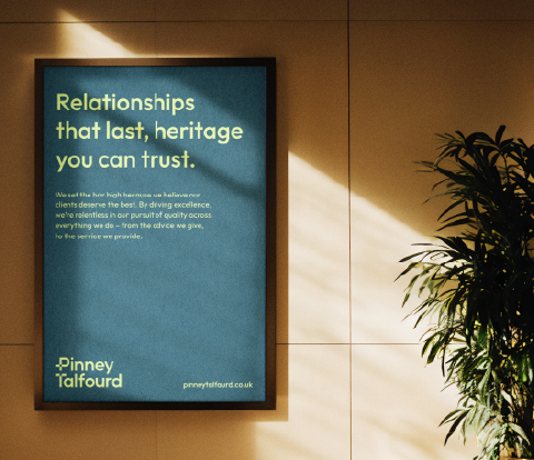 Pinney Talfourd poster indoors featuring the message ‘Relationships that last, heritage you can trust.’