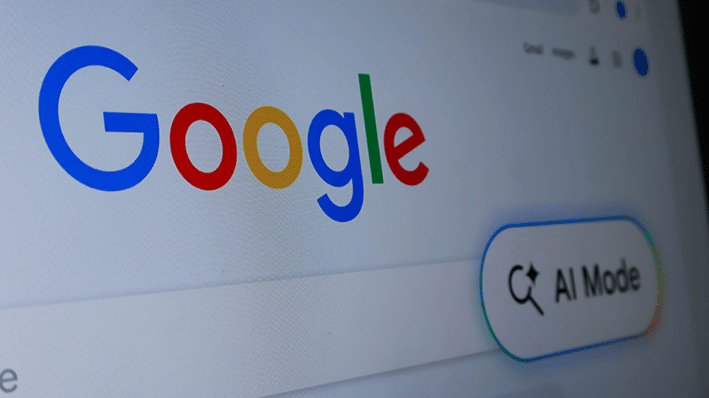 Google homepage displayed on a computer screen, featuring the Google logo and an "AI Mode" search option beside the search bar.